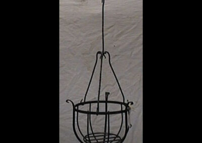 An 8-inch hanging basket by Live Iron Forge.
