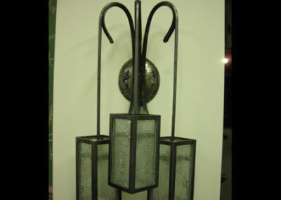 Wall sconce by Live Iron Forge.